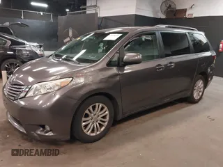 2015 Toyota Sienna XLE with VIN 5TDYK3DC3FS677780, listed as a IAAI auction lot 42155459 with 102,355 mi miles. Bid and sale history available at carsss.com. Image 17.