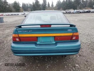 1995 Ford Escort z VIN 1FASP1284SW307142, wystawiony jako Copart lot #88531955 z przebiegiem 93 323 mil mil oraz Szkoda całkowita • Salvage title. Historia ofert i sprzedaży dostępna na DreamBid. Obrazek 6.