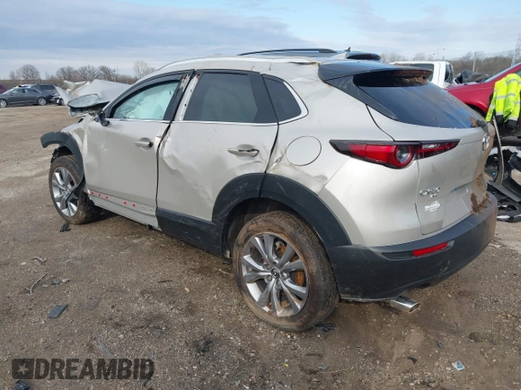 2023 Mazda CX-30 S Premium with VIN 3MVDMBDMXPM563500, listed as a IAAI auction lot 42092423 with 9,148 mi miles and . Bid and sale history available at DreamBid. Image 3.