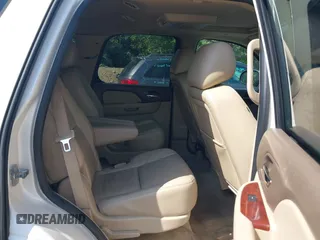 2013 Chevrolet Tahoe LTZ with VIN 1GNSKCE07DR326996, listed as a IAAI auction lot 42203073 with 147,067 mi miles and . Bid and sale history available at DreamBid. Image 8.