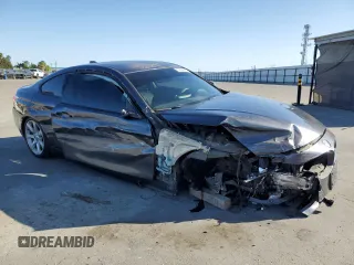 2015 BMW 4 Series 428i with VIN WBA3N7C54FK222324, listed as a Copart auction lot 57644345 with 114,696 mi miles and Salvage title. Bid and sale history available at DreamBid. Image 4.