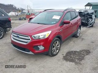 2018 Ford Escape SE z VIN 1FMCU9GD6JUA18684, wystawiony jako IAAI lot #41499540 z przebiegiem 105 127 mil mil oraz . Historia ofert i sprzedaży dostępna na DreamBid. Obrazek 17.