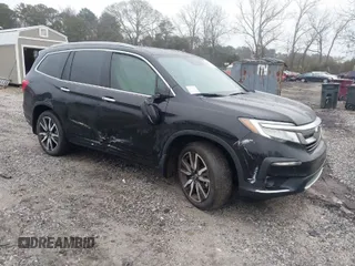 2022 Honda Pilot Touring 7-Passenger с VIN 5FNYF5H61NB013372, выставлен на аукционе IAAI как лот 41595890 с пробегом 53 664 миль миль и . История ставок и продаж доступна на DreamBid. Изображение 1.