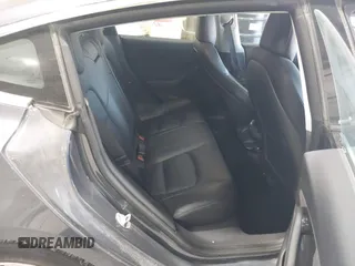 2018 Tesla Model 3 Long Range Battery with VIN 5YJ3E1EB1JF145520, listed as a IAAI auction lot 41360939 with 95,010 mi miles and . Bid and sale history available at DreamBid. Image 8.