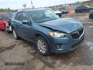 2014 Mazda CX-5 Grand Touring with VIN JM3KE4DYXE0403192, listed as a IAAI auction lot 41828016 with 156,270 mi miles and . Bid and sale history available at carsss.com. Image 1.