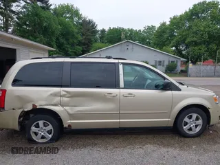 2010 Dodge Grand Caravan Hero z VIN 2D4RN3D17AR390232, wystawiony jako IAAI lot #42301567 z przebiegiem 102 004 mil mil oraz . Historia ofert i sprzedaży dostępna na DreamBid. Obrazek 13.