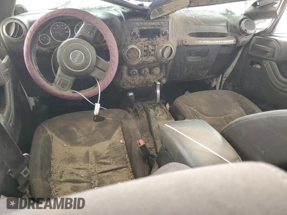 2013 Jeep Wrangler Unlimited Sport z VIN 1C4BJWDG8DL513680, wystawiony jako Copart lot #53805485 z przebiegiem 135 676 mil mil oraz Szkoda całkowita • Salvage title. Historia ofert i sprzedaży dostępna na DreamBid. Obrazek 8.