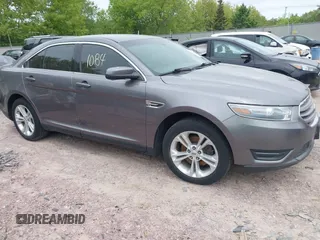 2014 Ford Taurus SEL z VIN 1FAHP2E8XEG133233, wystawiony jako IAAI lot #42291084 z przebiegiem 182 102 mil mil oraz . Historia ofert i sprzedaży dostępna na DreamBid. Obrazek 1.