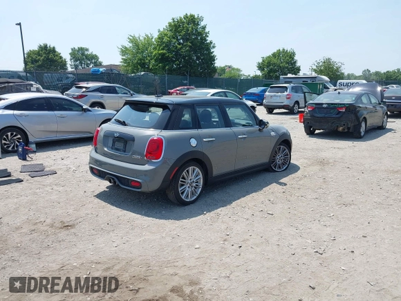 2019 MINI Hardtop 4 Door Cooper S with VIN WMWXU3C57K2H54547, listed as a IAAI auction lot 42492037 with 74,657 mi miles and . Bid and sale history available at DreamBid. Image 4.
