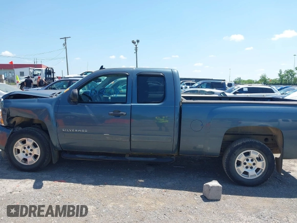 2011 Chevrolet Silverado 1500 LT with VIN 1GCRCSE05BZ202981, listed as a IAAI auction lot 42136318 with 106,277 mi miles and . Bid and sale history available at DreamBid. Image 13.
