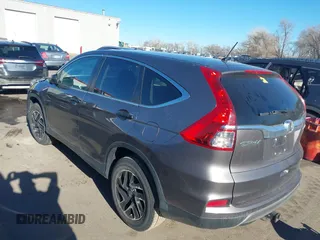 2016 Honda CR-V SE with VIN 5J6RM4H40GL118420, listed as a IAAI auction lot 41879744 with 105,792 mi miles and . Bid and sale history available at carsss.com. Image 3.