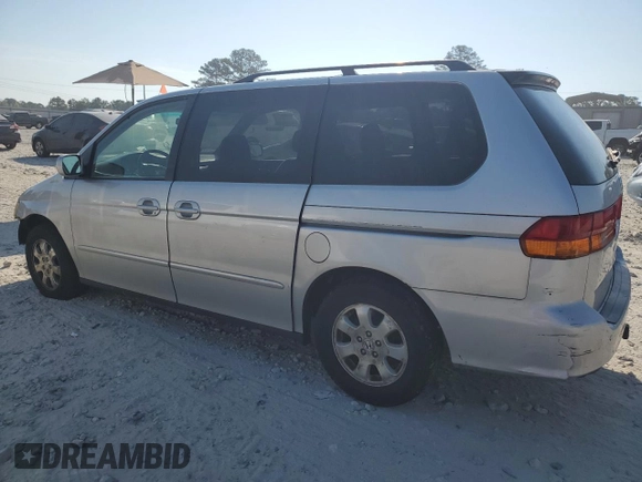 2003 Honda Odyssey EX z VIN 5FNRL18673B014271, wystawiony jako Copart lot #68613374 z przebiegiem 236 360 mil mil oraz Nie do naprawy • Non repairable. Historia ofert i sprzedaży dostępna na DreamBid. Obrazek 2.