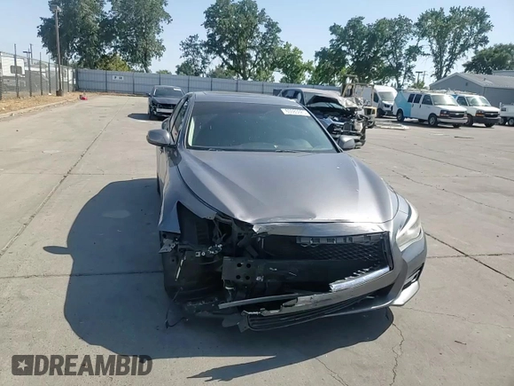 2014 Infiniti Q50 Premium with VIN JN1BV7AP2EM677469, listed as a Copart auction lot 61627125 with 106,670 mi miles and Salvage title. Bid and sale history available at DreamBid. Image 14.