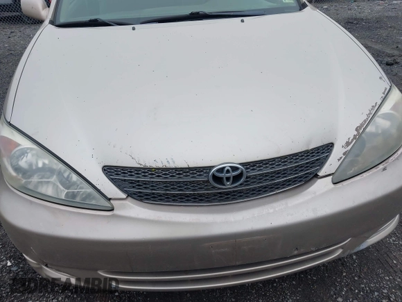 2004 Toyota Camry LE with VIN 4T1BE30KX4U327013, listed as a IAAI auction lot 41987105 with 241,236 mi miles. Bid and sale history available at carsss.com. Image 6.