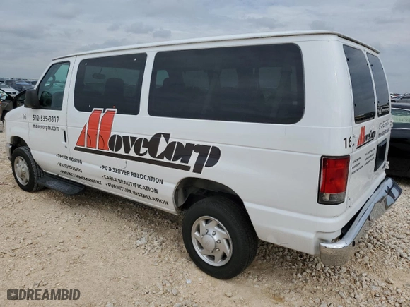 2014 Ford Econoline Wagon XL with VIN 1FBNE3BL4EDA25746, listed as a Copart auction lot 69606994 with 107,842 mi miles and Salvage Title. Bid and sale history available at carsss.com. Image 2.