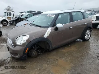 2014 MINI Countryman with VIN WMWZB3C55EWR42234, listed as a Copart auction lot 50979705 with 161,289 mi miles and Salvage Title. Bid and sale history available at DreamBid. Image 1.