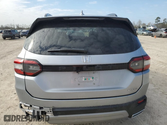 2023 Honda Pilot Touring with VIN 5FNYG2H73PB000923, listed as a Copart auction lot 41459755 with 39,829 mi miles and Salvage title. Bid and sale history available at DreamBid. Image 6.