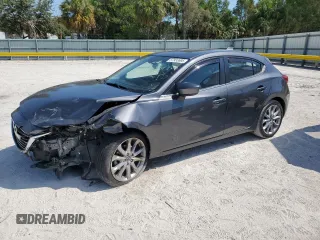 2014 Mazda 3 S Grand Touring with VIN JM1BM1M34E1186442, listed as a Copart auction lot 57933695 with 116,741 mi miles and Salvage title. Bid and sale history available at DreamBid. Image 1.