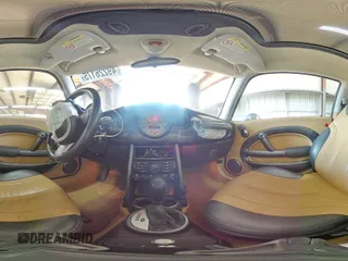 2004 MINI Hardtop with VIN WMWRC33474TJ58626, listed as a Copart auction lot 49226175 with 116,115 mi miles and Salvage Title. Bid and sale history available at DreamBid. Image 13.