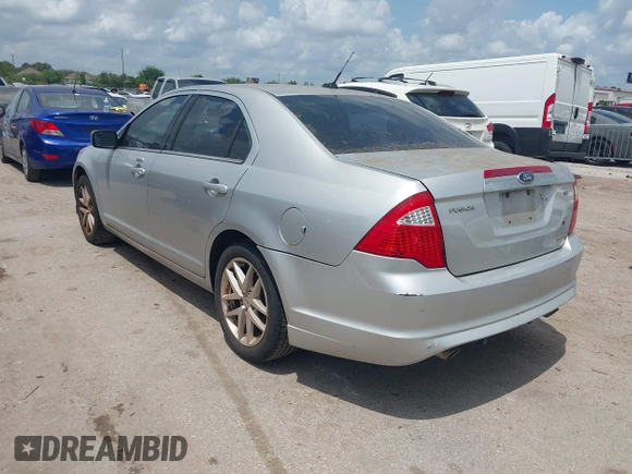 2012 Ford Fusion SEL with VIN 3FAHP0JG7CR302910, listed as a IAAI auction lot 42100004 with 215,761 mi miles. Bid and sale history available at carsss.com. Image 3.