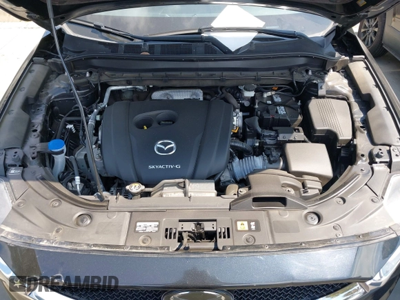 2020 Mazda CX-5 Grand Touring with VIN JM3KFADM3L1819939, listed as a IAAI auction lot 42749920 with 35,407 mi miles and . Bid and sale history available at DreamBid. Image 10.