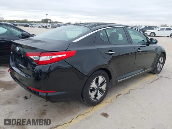 2012 Kia Optima Hybrid with VIN KNAGM4AD8C5021615, listed as a IAAI auction lot 41216697 with 119,153 mi miles. Bid and sale history available at carsss.com. Image 4.