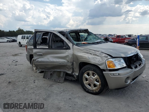 2002 GMC Envoy SLT with VIN 1GKDT13SX22380133, listed as a Copart auction lot 69816144 with 90,060 mi miles and Salvage Title. Bid and sale history available at DreamBid. Image 4.