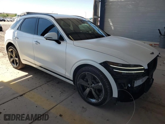 2022 Genesis GV70 Sport z VIN KMUMCDTC7NU038800, wystawiony jako Copart lot #71394474 z przebiegiem 40 933 mil mil oraz Szkoda całkowita • Salvage title. Historia ofert i sprzedaży dostępna na DreamBid. Obrazek 4.