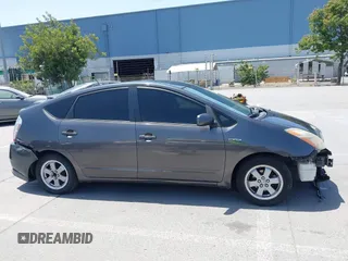 2008 Toyota Prius z VIN JTDKB20U683303442, wystawiony jako IAAI lot #42395845 z przebiegiem 231 883 mil mil oraz . Historia ofert i sprzedaży dostępna na DreamBid. Obrazek 14.