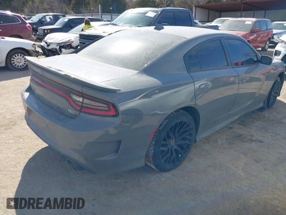 2019 Dodge Charger R/T z VIN 2C3CDXCTXKH607784, wystawiony jako IAAI lot #41667401 z przebiegiem 120 644 mil mil oraz . Historia ofert i sprzedaży dostępna na DreamBid. Obrazek 4.