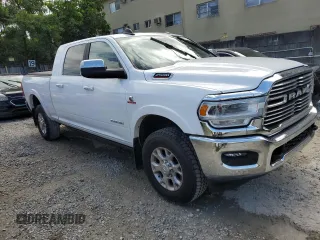 2020 Ram 2500 Laramie with VIN 3C6UR5NL8LG313893, listed as a Copart auction lot 42675764 with 128,135 mi miles and Salvage Title. Bid and sale history available at carsss.com. Image 4.