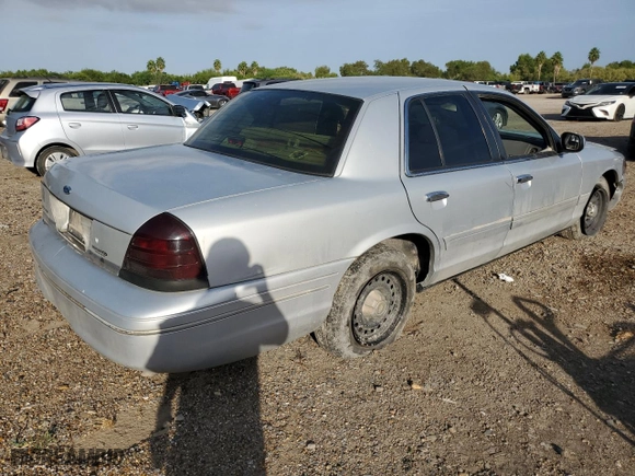 2000 Ford Crown Victoria with VIN 2FAFP73W5YX181565, listed as a Copart auction lot 77098594 with 180,439 mi miles and Salvage Title. Bid and sale history available at carsss.com. Image 3.