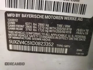 2013 BMW X5 xDrive35i z VIN 5UXZV4C5XD0B23352, wystawiony jako Copart lot #57481655 z przebiegiem 126 891 mil mil oraz Szkody całkowita. Historia ofert i sprzedaży dostępna na DreamBid. Obrazek 12.