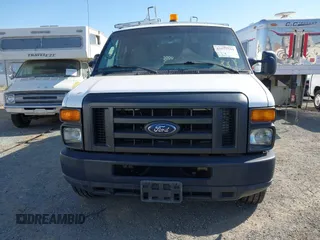 2009 Ford Econoline Cargo with VIN 1FTNE24L59DA13632, listed as a IAAI auction lot 42557559 with 90,487 mi miles and . Bid and sale history available at DreamBid. Image 6.