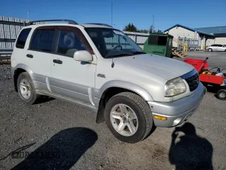 2003 Suzuki Grand Vitara z VIN JS3TD62V234103268, wystawiony jako Copart lot #76276914 z przebiegiem 133 227 mil mil oraz Czysty tytuł • Clean title. Historia ofert i sprzedaży dostępna na DreamBid. Obrazek 4.