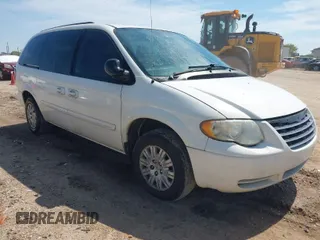2006 Chrysler Town & Country LWB LX with VIN 2A4GP44RX6R799790, listed as a IAAI auction lot 41890709 with 151,443 mi miles. Bid and sale history available at carsss.com. Image 1.