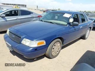 2008 Ford Police Interceptor z VIN 2FAHP71VX8X137757, wystawiony jako IAAI lot #42651380 z przebiegiem 181 684 mil mil oraz . Historia ofert i sprzedaży dostępna na DreamBid. Obrazek 2.