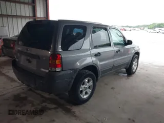 2007 Ford Escape XLT with VIN 1FMYU03187KA14931, listed as a IAAI auction lot 42198989 with 89,023 mi miles and . Bid and sale history available at DreamBid. Image 4.