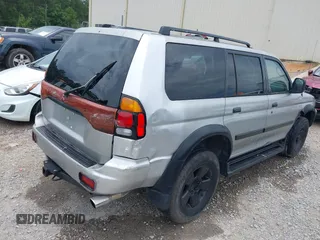 2001 Mitsubishi Montero ES z VIN JA4LS21H11P038976, wystawiony jako IAAI lot #42347453 z przebiegiem 304 822 mil mil oraz . Historia ofert i sprzedaży dostępna na DreamBid. Obrazek 4.