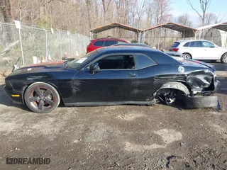 2013 Dodge Challenger SXT with VIN 2C3CDYAG5DH520017, listed as a IAAI auction lot 41882517 with 128,854 mi miles. Bid and sale history available at carsss.com. Image 14.
