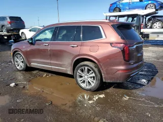 2023 Cadillac XT6 AWD Premium Luxury z VIN 1GYKPDRS0PZ112068, wystawiony jako Copart lot #46538575 z przebiegiem 52 016 mil mil oraz Szkoda całkowita • Salvage title. Historia ofert i sprzedaży dostępna na DreamBid. Obrazek 2.