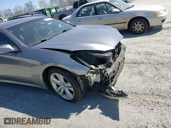 2010 Hyundai Genesis Coupe z VIN KMHHT6KD1AU028439, wystawiony jako Copart lot #50061765 z przebiegiem 157 006 mil mil oraz Szkoda całkowita • Salvage title. Historia ofert i sprzedaży dostępna na DreamBid. Obrazek 11.