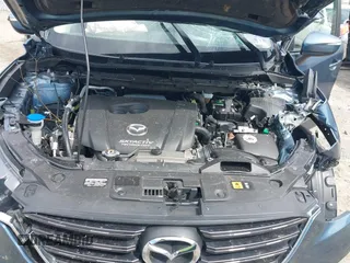 2016 Mazda CX-5 Grand Touring with VIN JM3KE4DY0G0629924, listed as a IAAI auction lot 41878154 with 78,196 mi miles. Bid and sale history available at carsss.com. Image 10.