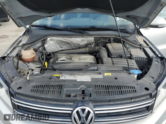 2013 Volkswagen Tiguan S z VIN WVGAV3AX2DW616476, wystawiony jako Copart lot #55313615 z przebiegiem 129 105 mil mil oraz Szkody całkowita. Historia ofert i sprzedaży dostępna na DreamBid. Obrazek 11.