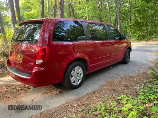 2013 Dodge Grand Caravan SE with VIN 2C4RDGBG7DR506614, listed as a Copart auction lot 54992185 with 154,290 mi miles and Clean Title. Bid and sale history available at DreamBid. Image 4.