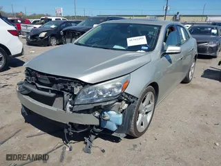 2014 Chevrolet Malibu LTZ with VIN 1G11J5SX6EF176489, listed as a IAAI auction lot 41762393 with 107,623 mi miles. Bid and sale history available at carsss.com. Image 2.