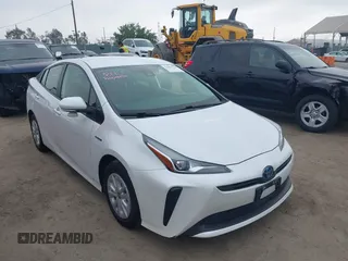 2021 Toyota Prius L Eco with VIN JTDKAMFU0M3133093, listed as a IAAI auction lot 42602728 with 53,068 mi miles and . Bid and sale history available at DreamBid. Image 1.