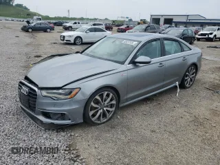 2014 Audi A6 Prestige z VIN WAUHGAFC9EN023158, wystawiony jako Copart lot #60537325 z przebiegiem 115 075 mil mil oraz Nie do naprawy • Non repairable. Historia ofert i sprzedaży dostępna na DreamBid. Obrazek 1.