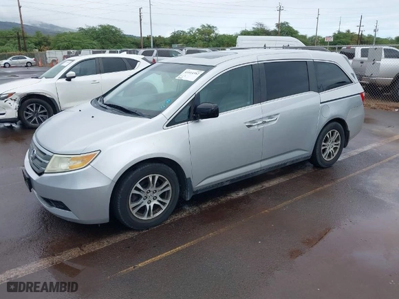 2012 Honda Odyssey EX-L with VIN 5FNRL5H68CB056567, listed as a IAAI auction lot 41014382 with 101,885 mi miles. Bid and sale history available at carsss.com. Image 2.