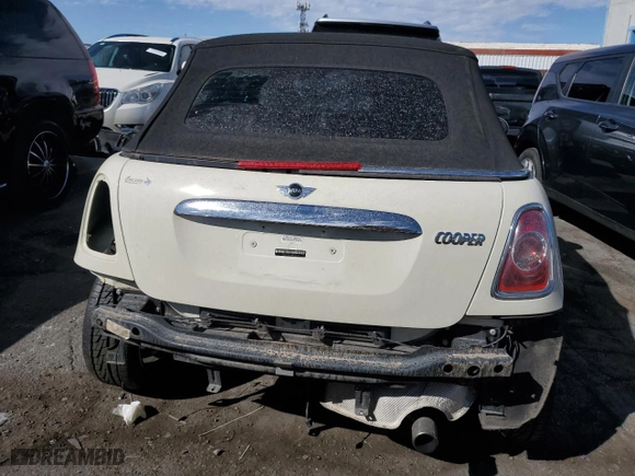 2014 MINI Cooper Convertible with VIN WMWZN3C59ET569823, listed as a Copart auction lot 72543194 with 56,730 mi miles and Salvage Title. Bid and sale history available at carsss.com. Image 6.